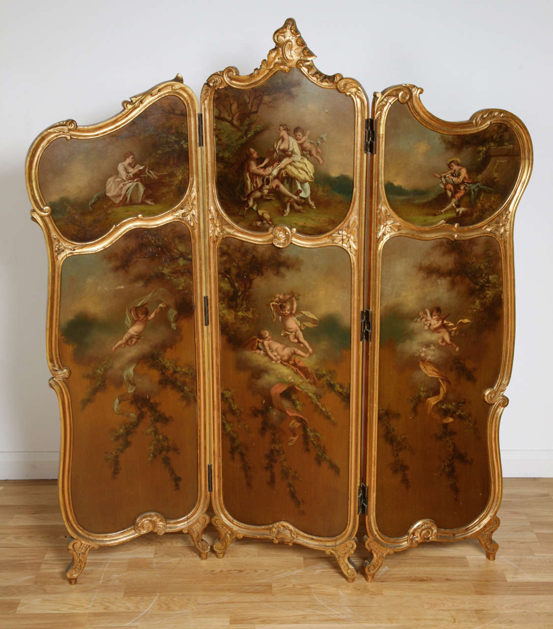 Painted to the front and rear with outdoor scenes of nature, with courting couples and winged cherubs, in the typical Rococo style.