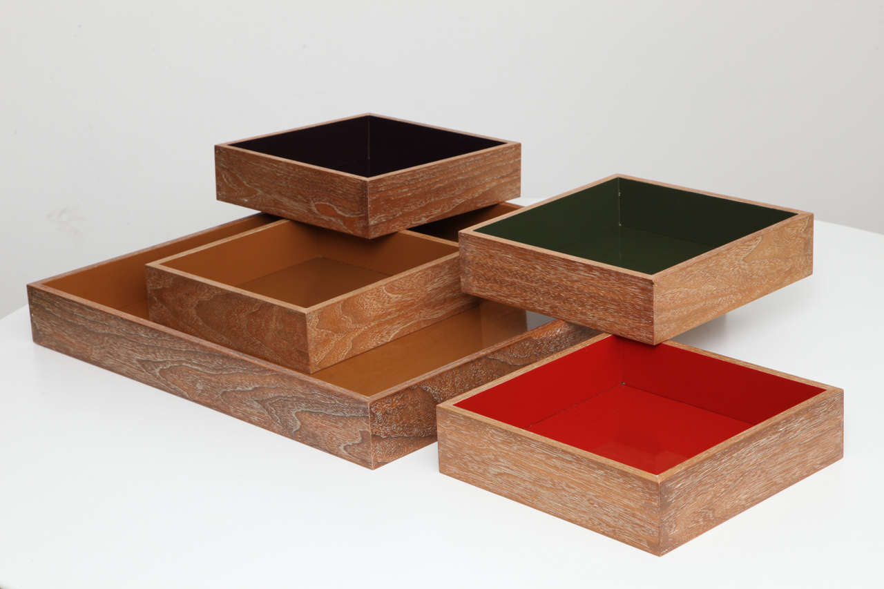 Gorgeous vintage trays custom made for the Takashimaya New York store on 5th Avenue, circa 1980s. Each one is made of cerused oak finished in a solid red, plum, green or ochre lacquered interior. Large tray measures 24 x 24 x 3