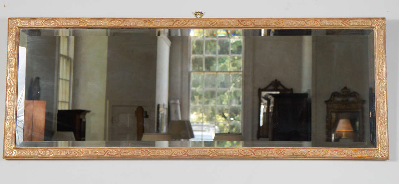 English 18th century gilt wood rectangular mirror. Carved frame. Original back plate. Bevelled mirror plate.