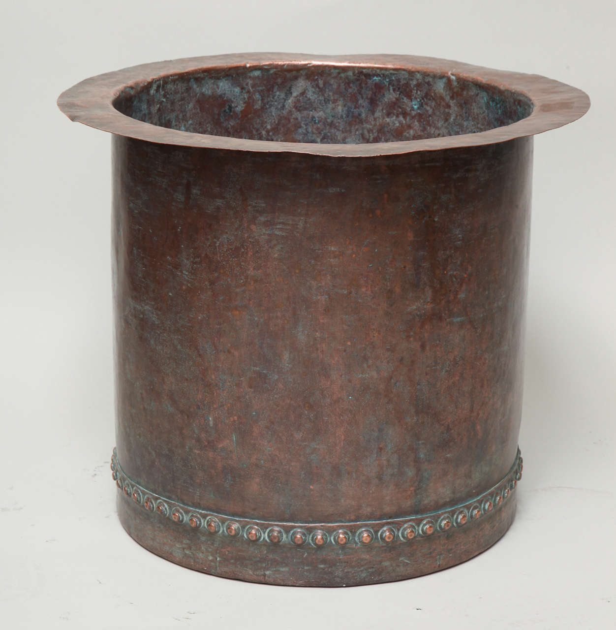 A fantastic riveted copper oversize log bin having beautiful bronzed patina, England, early 19th century.