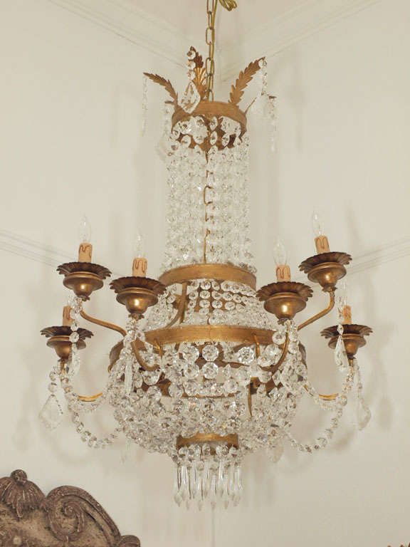 Beautiful Swedish style chandelier, handcrafted in Italy by a second generation chandelier artisan using large and heavy Murano glass crystals. Large, 1 inch octagonal Murano glass bead chains drape from top of chandelier and at the bottom, forming