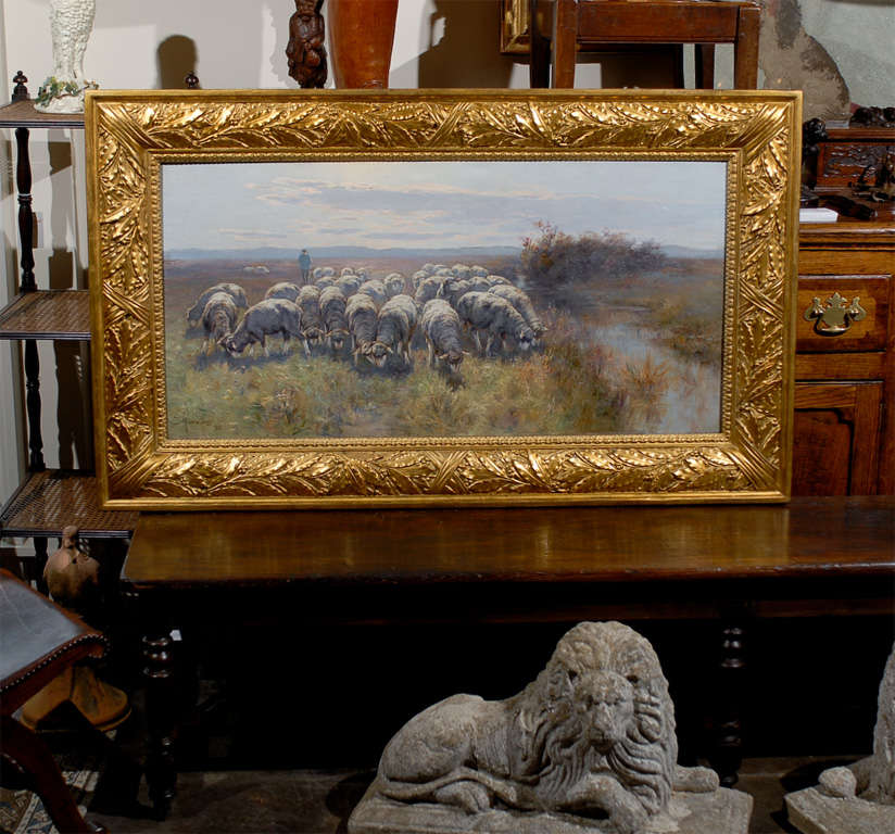 A Swedish pastoral oil on canvas sheep painting created by Swedish artist Friedrich Rudolph von Frisching (1833-1906), set inside a giltwood frame. This exquisite Swedish painting of horizontal format features a flock of sheep peacefully grazing