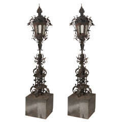 Antique Pair Of Old Iron Torchieres On Marble Bases