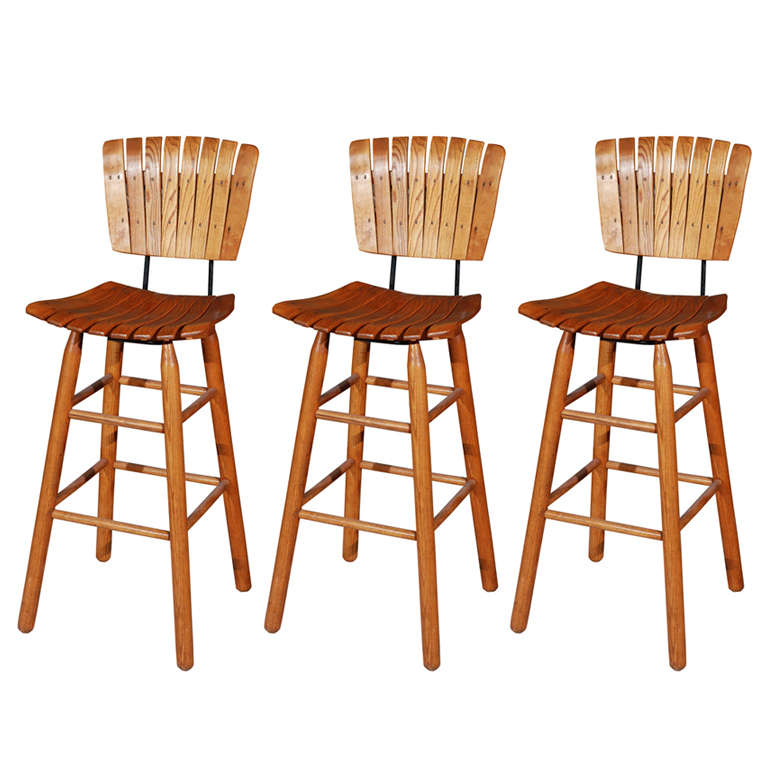 Set Of Three 1950 Arthur Umanoff Walnut Barstools For Sale