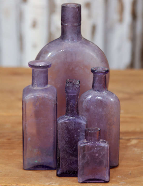 American group of 5 purple bottles