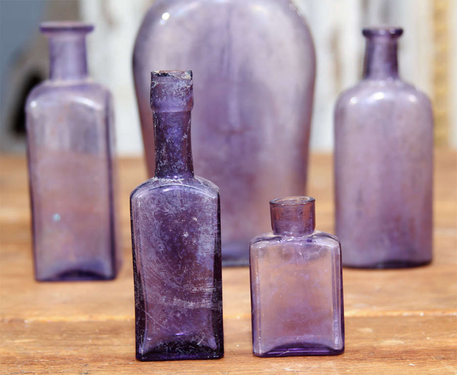 group of 5 purple bottles 1
