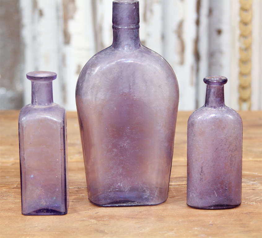 group of 5 purple bottles 2