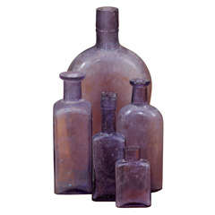 Antique group of 5 purple bottles