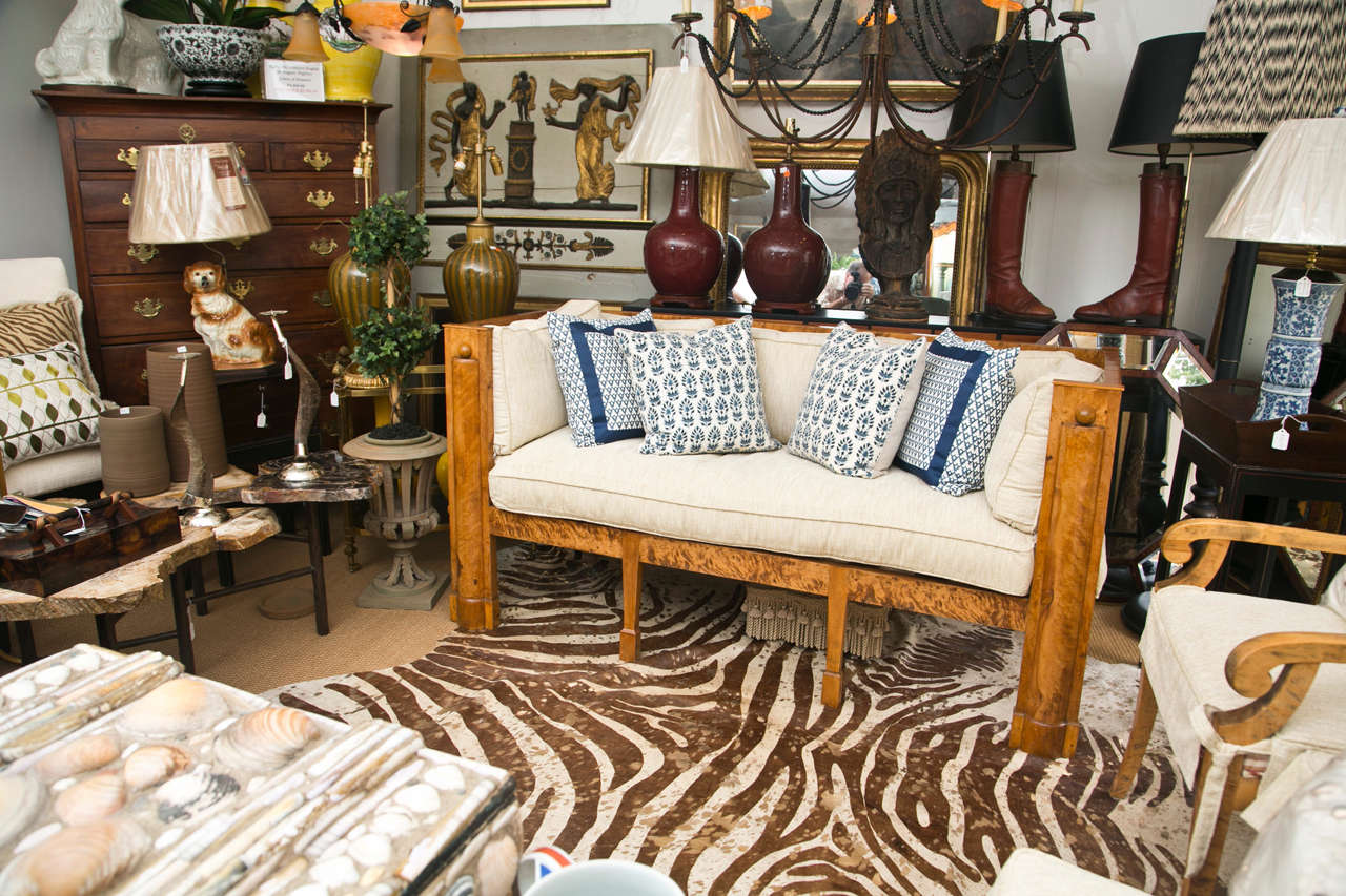 A Biedermeier sofa with strong clean lines of a rich honey toned tiger maple.