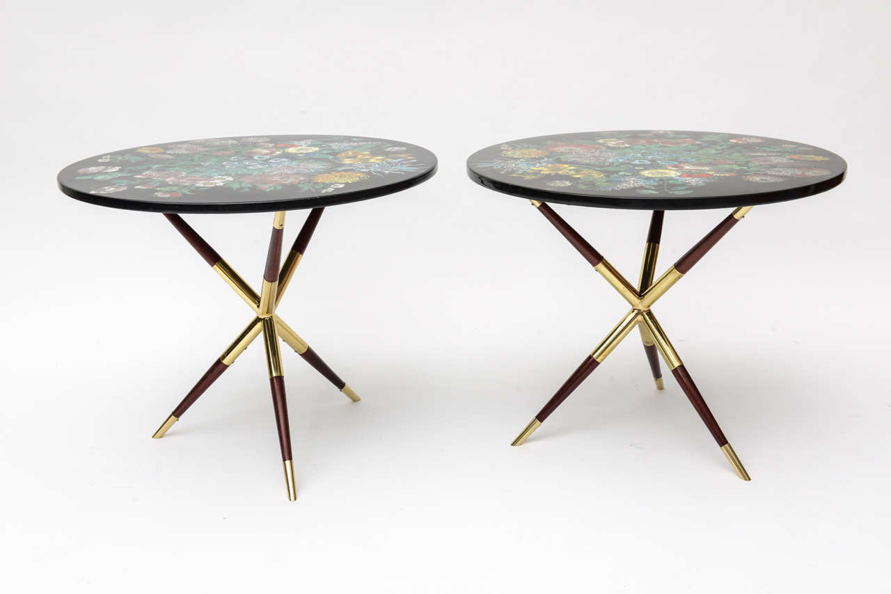 Beautiful pair of side tables by Piero Fornasetti.
Paper label below