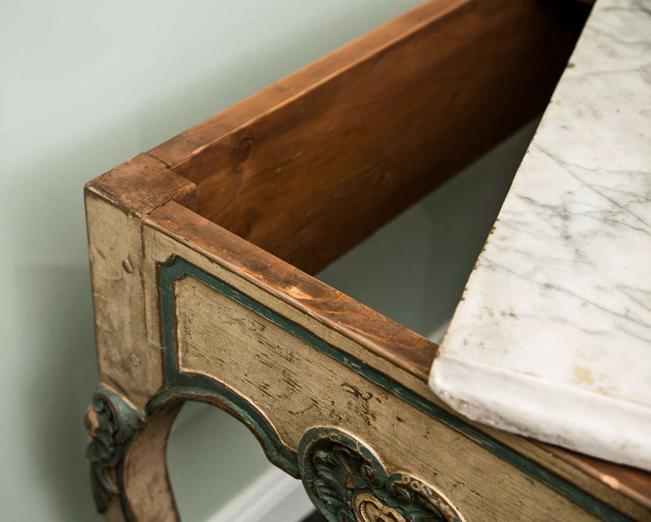 Lovely and large French painted Louis XV console with creme and teal hues, marble from the 18th century, frame from turn of the 20th century.
Would make a gracious vanity.