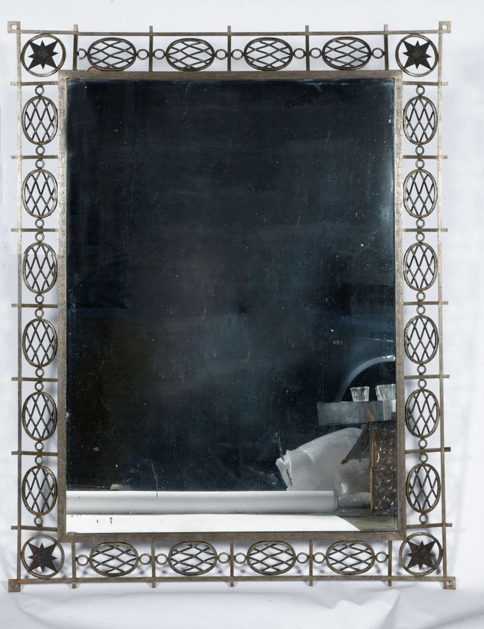 One of a kind neoclassical 1940s wrought iron mirror.
Original mirror possibility to changed it for a new one.