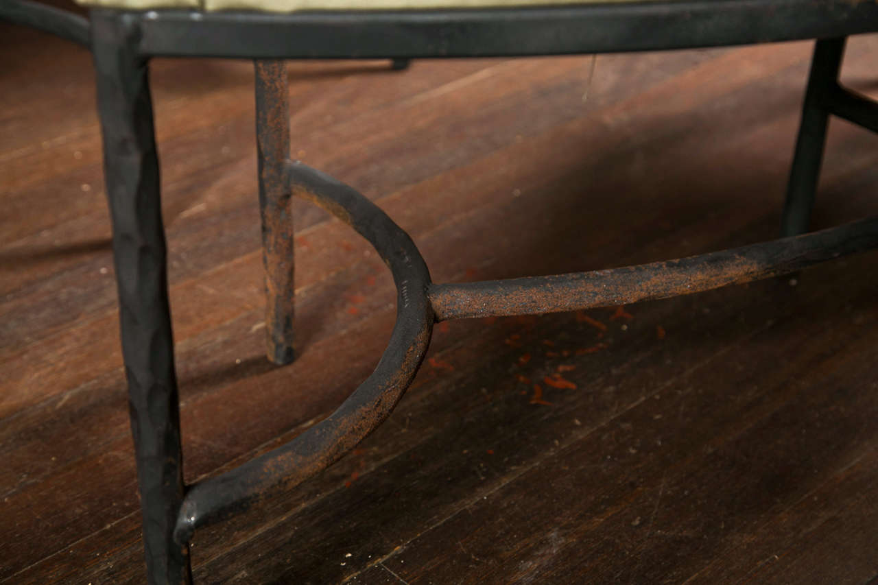 curved wrought iron bench