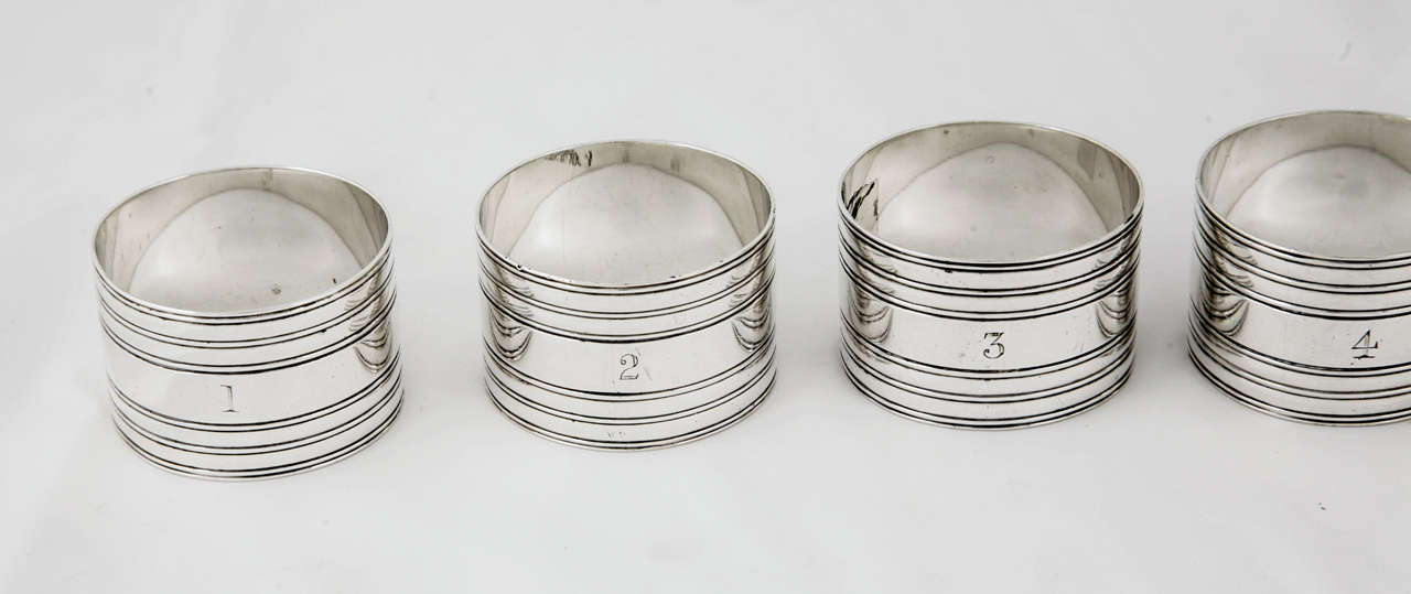 A Set of 6 Sterling Silver Napkin Rings in fitted case, Made by H. Atkin, in the city of Sheffield, England, 1902.
The napkin rings are numbered 1-6.