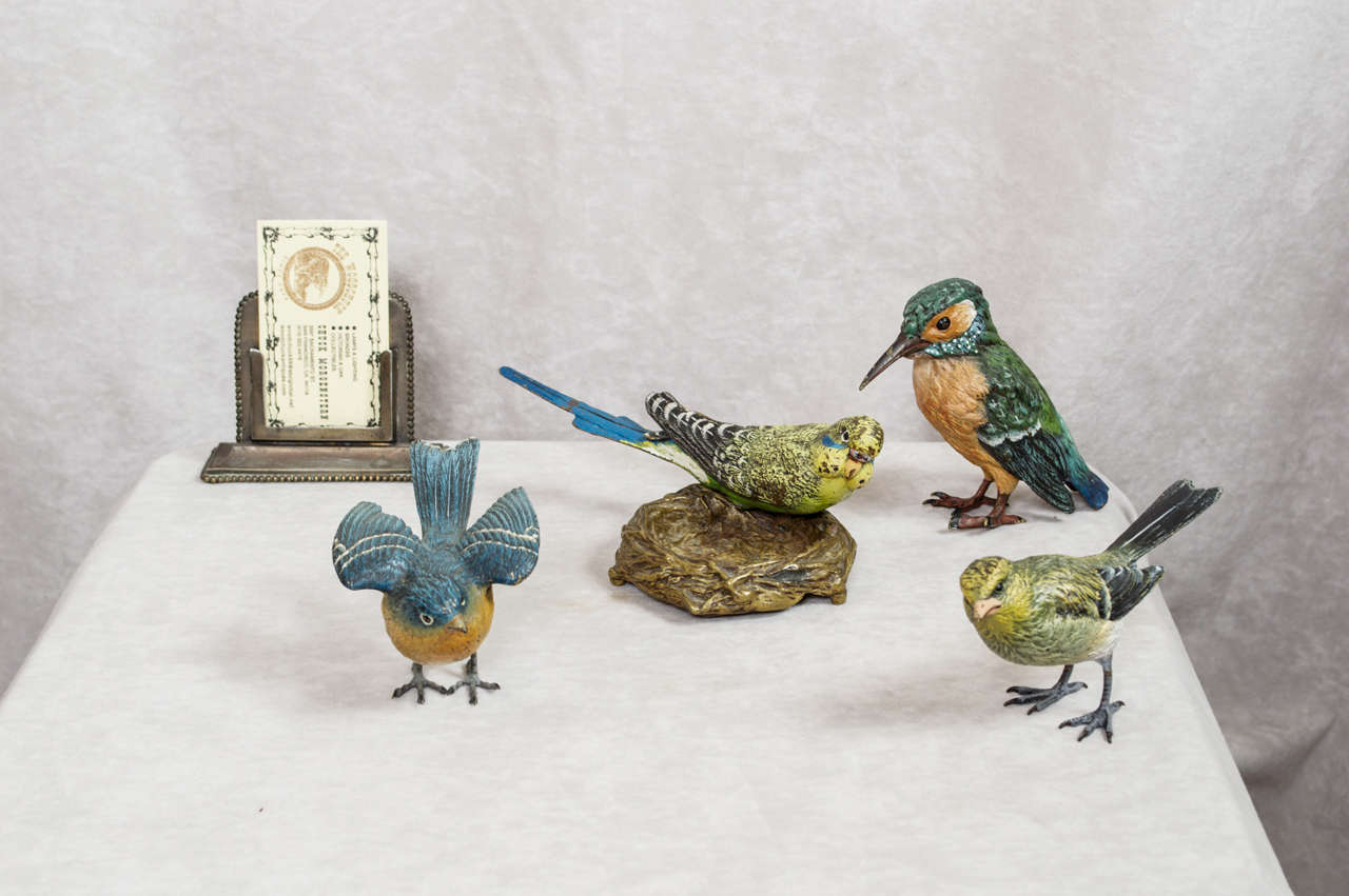 This is a fine collection of four birds done in Vienna, circa 1920.  Note the quality of the casting and the beautiful paint.  These are really quite large and are a feast for the eyes.  Note the size listed is for the bird in the nest.  We are