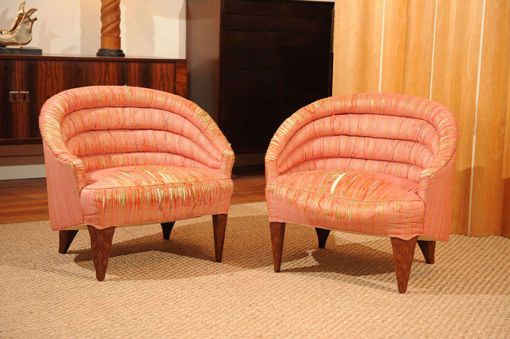 Rare pair of Dunbar slipper chairs designed by Edward Wormley for his Janus line. Snakeskin pattern carved legs with an elegant Silhouette. Labeled.