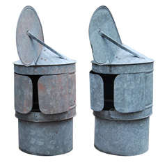 Antique Two galvanized rotating chimney pots