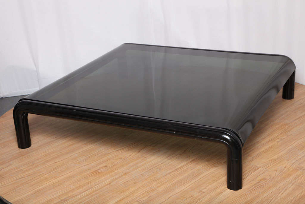 Monumental in scale at nearly 5 feet square (!), this low coffee table by notable Italian architect and designer Gae Aulenti, best known for working on large museum projects like the Musee d'Orsay, is truly something to behold.  Coffee tables this