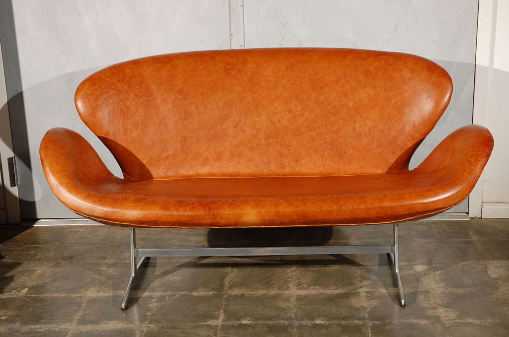 An Arne Jacobsen Swan Sofa, circa 1960's. This sofa has been stored in a Napa, California attic for the past thirty odd years and has only recently came onto the market. It will look the part and add interest in any setting. Jefferson West Antiques
