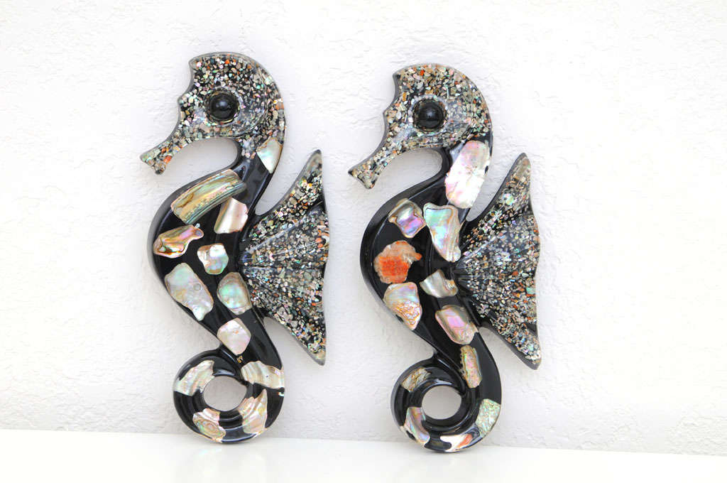 Delightful pair of hanging resin seahorses with iridescent shells.  Reduced from $250.00.