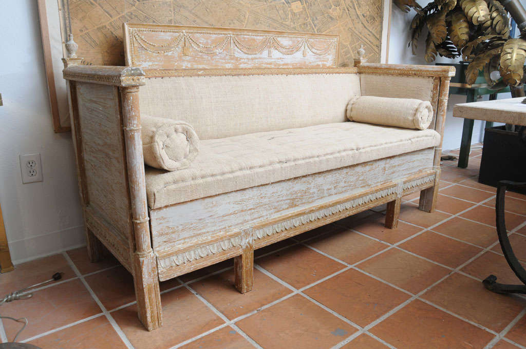 A very early Gustavian Bench, scraped to its original color, with beautiful carved decoration all around.
The bench lift up to underneath storage:  20 inches deep x 64 inches wide x 19.5 inches high