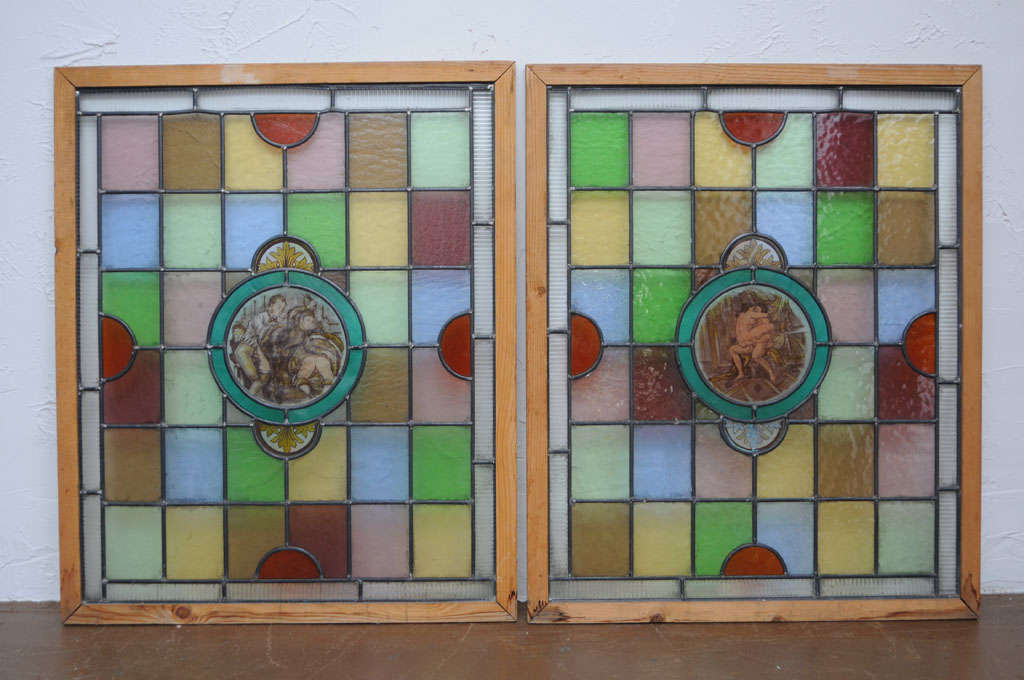 This handpainted pair of stained glass windows, depicting erotic scenes, came from a London brothel. These are very rare and unusual.