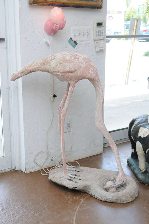 Fantastic 1940's cement flamingo guarding its' egg.