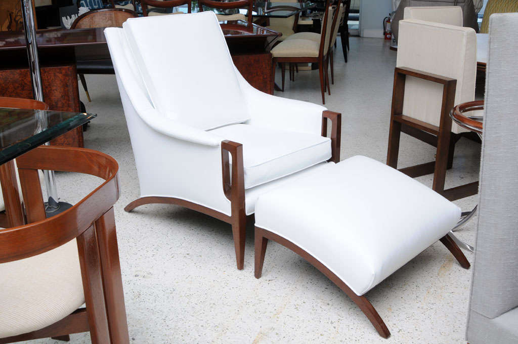 the mahogany frame with white leather upholstery