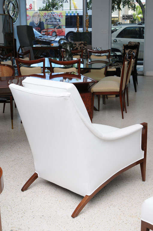 An Italian Modern Mahogany Armchair and Ottoman For Sale 3