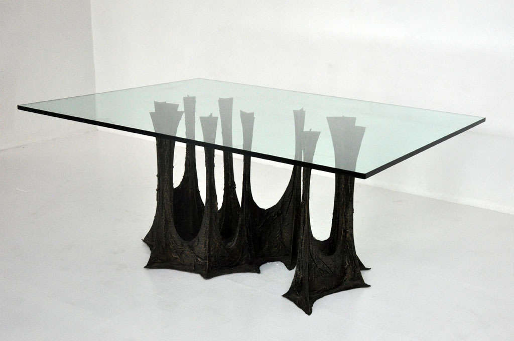 Sculpted bronze dining table by Paul Evans.  S-shape base with plate glass top.