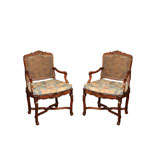 Two Similar Louis XV Walnut and Caned Armchairs