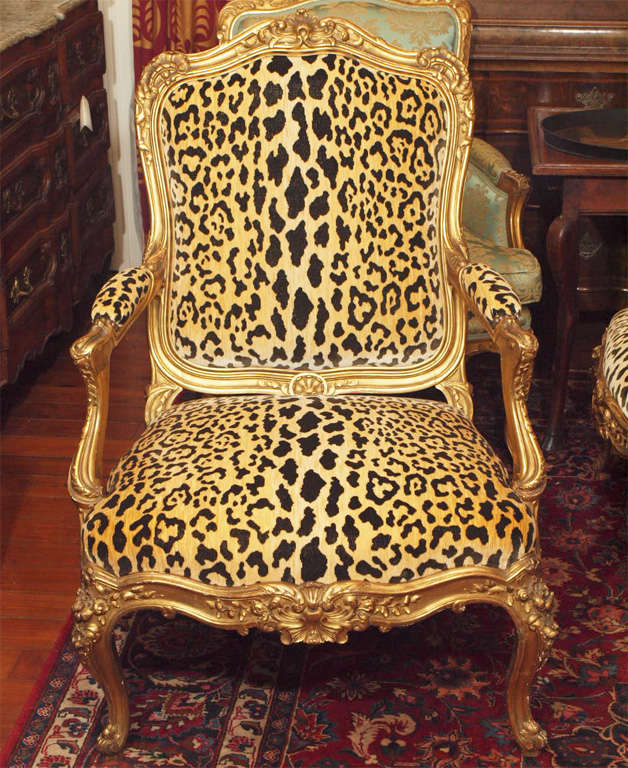 Pair of Italian Louis XV style Gilt wood armchairs with Clarence House Leopard Silk Velvet upholstry. Exceptional size and quality