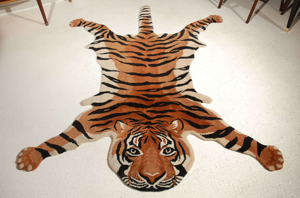This stunning thick pile wool rug depicts the exact pattern and coloring of one of nature's most beautiful and exotic animals, the Bengal tiger.