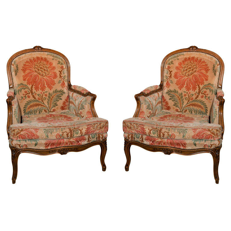 Pair of French Provincial Walnut Bergere Chairs