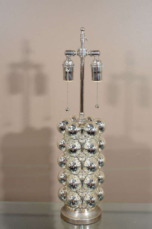 Pair of mercury glass bubble lamps, dated on inside, 1972. New nickel-plated brass hardware, with double sockets and pull chains.