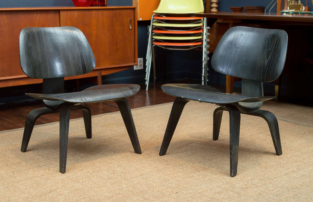 Matched original pair of Charles and Ray Eames designed LCW's for Herman Miller. Minor wear consistent with age.