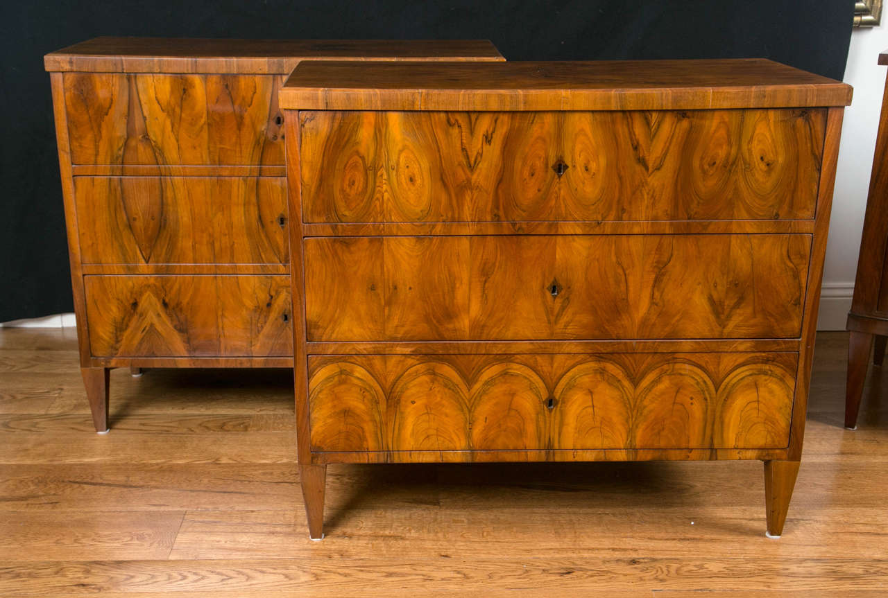 A handsome pair of Biedermeier chests in walnut veneer comprised of three drawers finishing on straight, tapered legs and embellished with inlaid diamond-shaped keyholes, Austria, circa 1890-1900.
Refurbished and recently French polished.
Note: