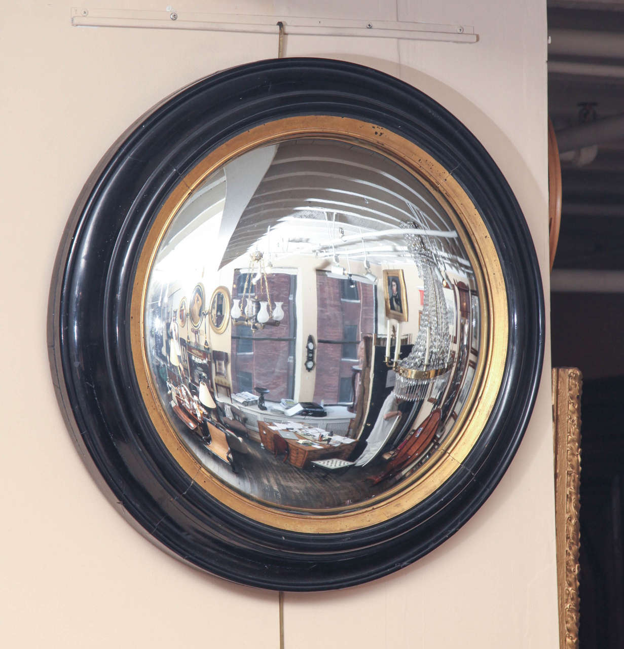Late 19th Century English Black Lacquer and Gilded Convex Mirror