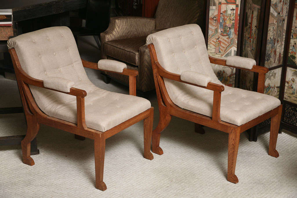 Pair of arm chairs in the incredible design of Marc du Plantier. They are covered in a beige linen. .