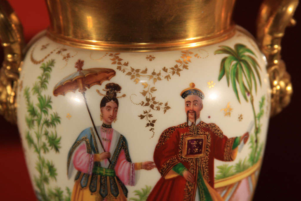 French Painted Porcelain and Gilt Urns For Sale