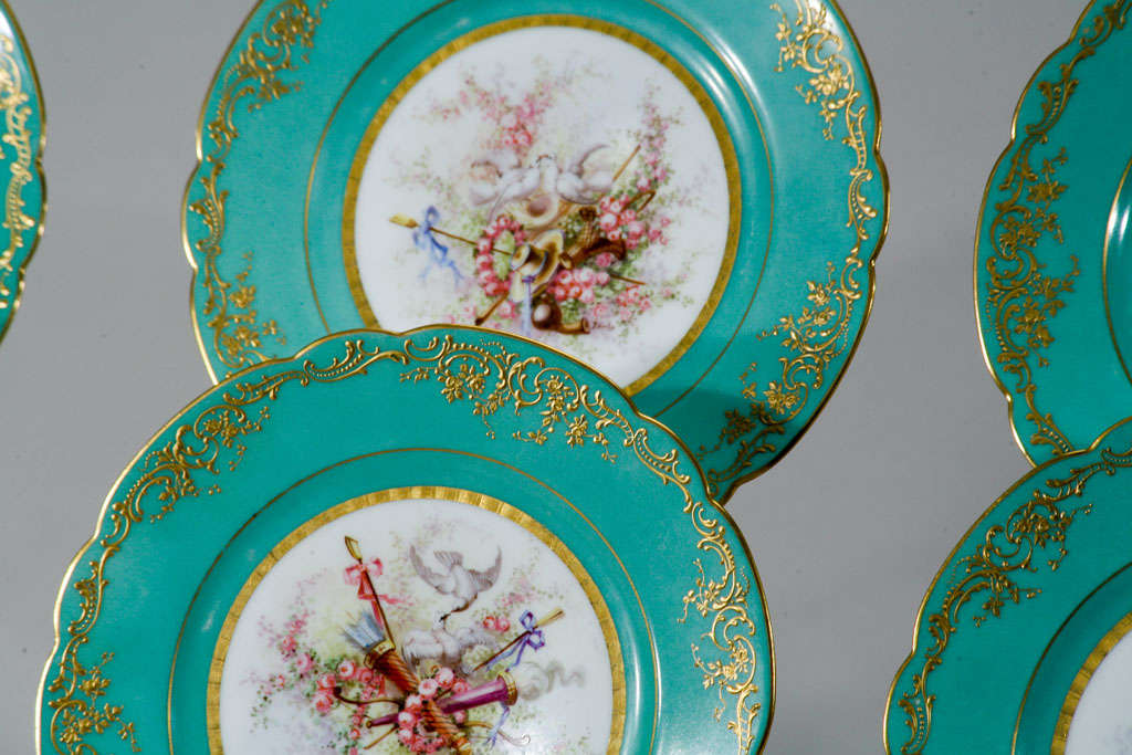 A magnificent set of 6 19th century Sevres plates with hand painted 