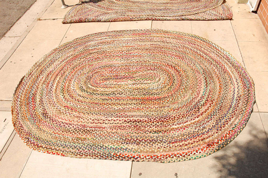 OVAL BRAIDED RUG SOUTH WESTERN COLORS 1 OF 2. THESE RUGS ARE SOLD INDIVIDUALY.BOTH ARE IN GREAT CONDITION AND FROM THE SAME HAND AND COLLECTION.