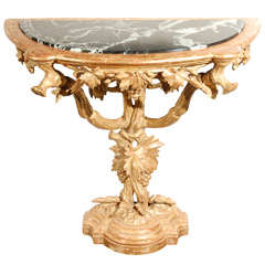 An Italian Giltwood Grotto Form Console Table with Faux Marble Top