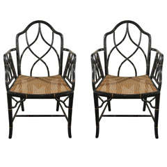 Pair of Regency Style Ebonized and Gilt faux Bamboo Arm Chairs
