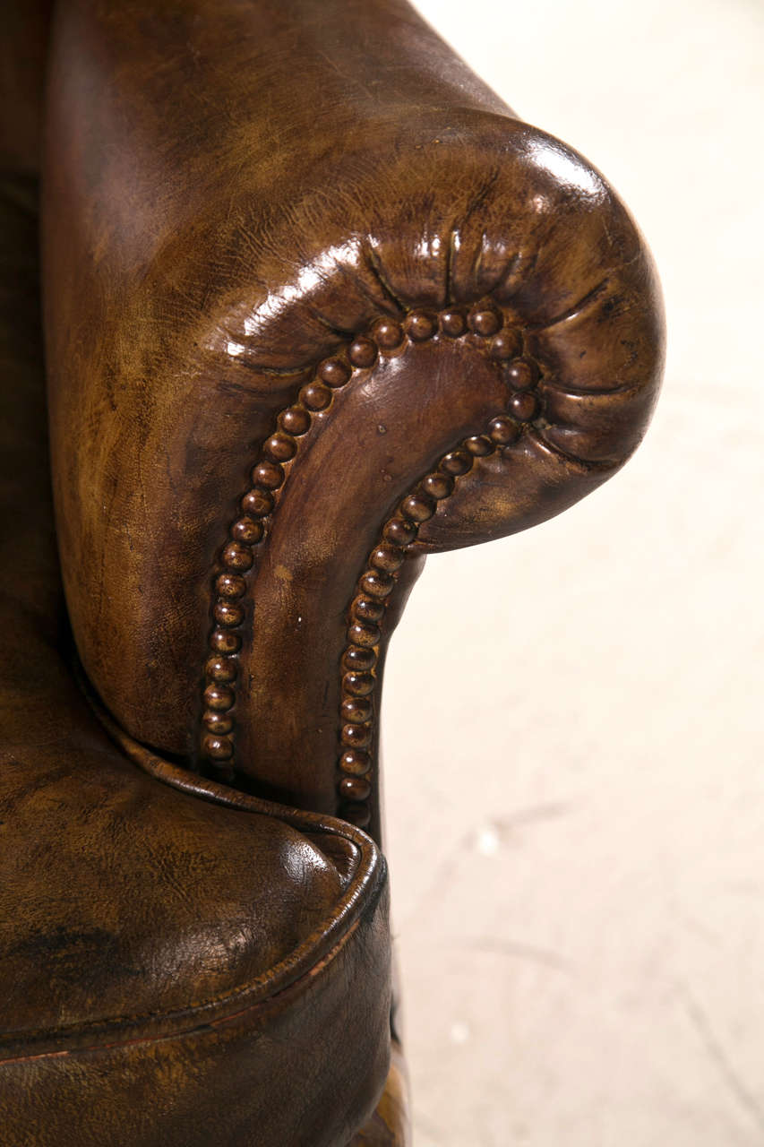 Late 19th C Leather Wingback Chair with Ball and Claw Feet 1