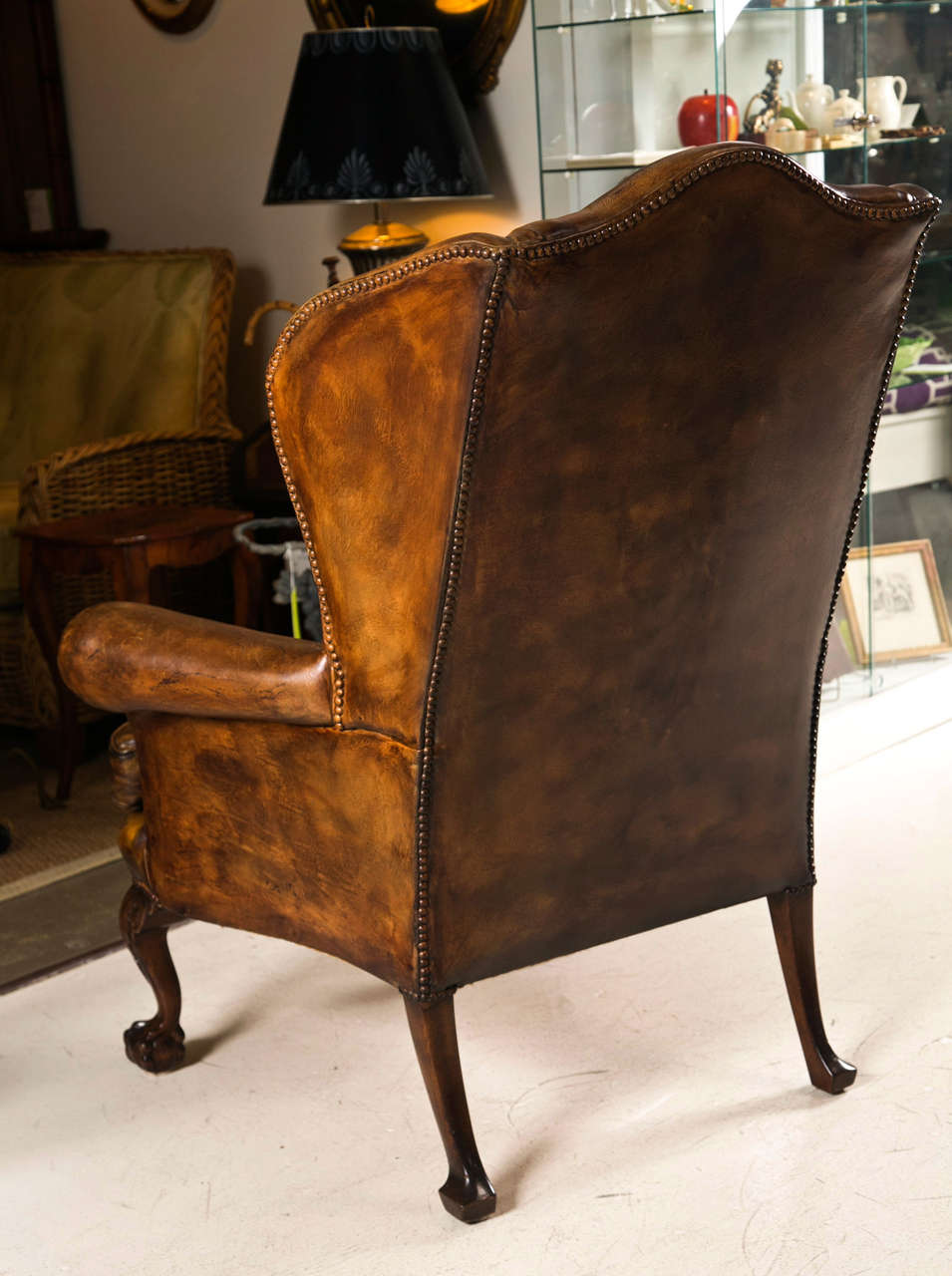 20th Century Late 19th C Leather Wingback Chair with Ball and Claw Feet