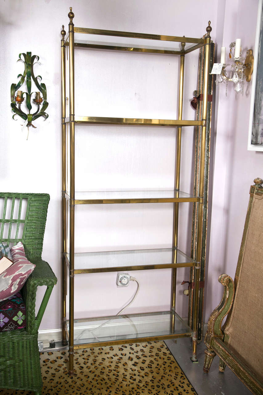 One Continental Brass Plated Shelf Etageres