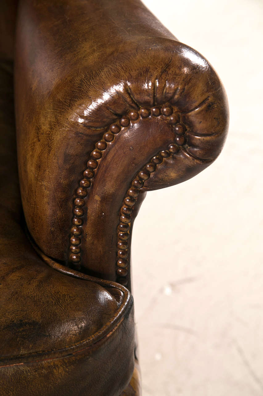 Late 19th C Leather Wingback Chair with Ball and Claw Feet at 1stDibs