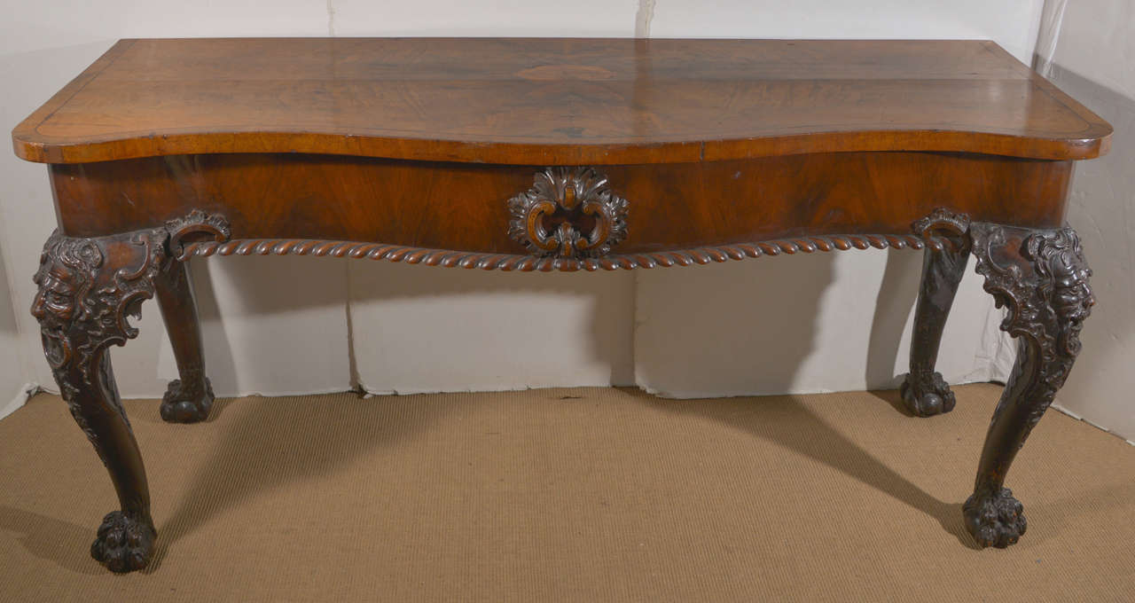 A George II carved wood console table. Circa 1740.