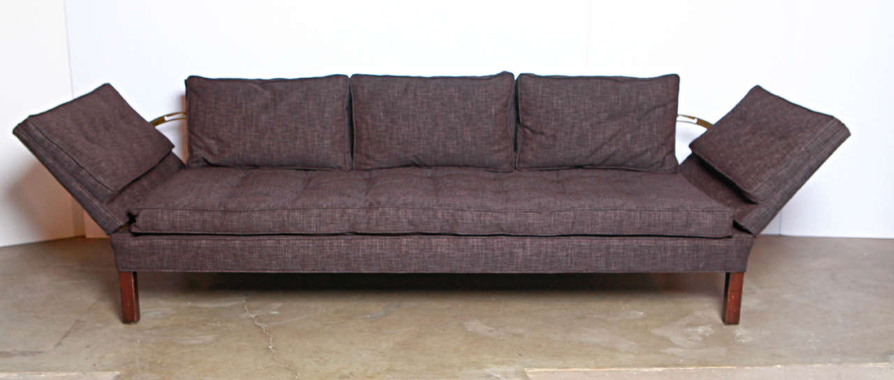 Rare 1940's Edward Wormley for Dunbar drop arm sofa in charcoal upholstery. All original hardware in great working condition. Mr. Wormley's take on the classic drop arm sofa is as32 traditional or as casual as you want it to be at the touch of a